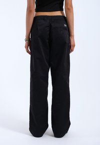 Dr.Denim HILL - Trousers - black