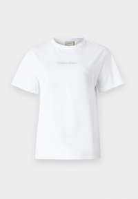 Witte katoenen t-shirt met korte mouwen, ronde halslijn en subtiele grijze "Calvin Klein" logo aan de voorkant. Verweving van een gladde textuur, klassieke pasvorm.