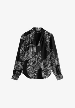 Čierna blúzka s dlhými rukávmi, zdobená odvážnym bielym abstraktným vzorom listov a pruhov; ľahká tkanina s voľným strihom a golierom.