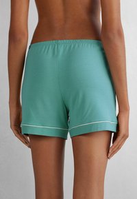 Intimissimi AUS MIT KANTEN IN KONTRA  - Pyžamový spodní díl - blau lagoon blue