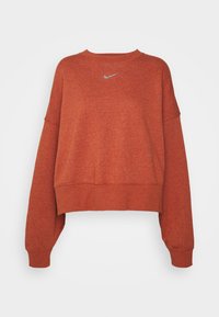 Felpa a maniche lunghe color ruggine con un piccolo logo Nike bianco a forma di swoosh centrato vicino al collo su uno sfondo neutro.