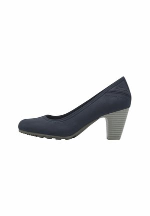 Navy high-heeled shoe with a textured fabric upper and a striped grey block heel. Rounded toe design with a slip-on style.