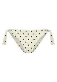 Culotte bikini crema con pois neri, dotata di lacci regolabili sui lati e una texture a coste per un dettaglio in più.
