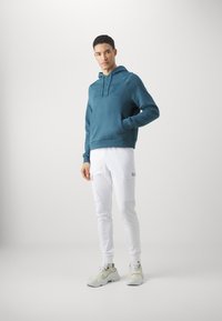 EA7 Emporio Armani UNISEX - Kapuzenpullover - verde scuro