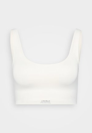 White sleeveless bralette made of smooth fabric, featuring a scoop neckline and a fitted design with subtle branding at the bottom.