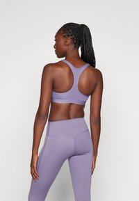 Nike Performance BRA - Sportski grudnjak s blagom potporom - daybreak/white