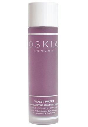 Flacon du tonic clarifiant Oskia London Violet Water pour nettoyer, exfolier et illuminer la peau grâce à l'acide salicylique et au saule violet.