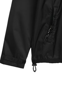 Manche de veste noire avec poignet ajustable en Velcro, poche zippée et cordon élastique avec toggle au bas.