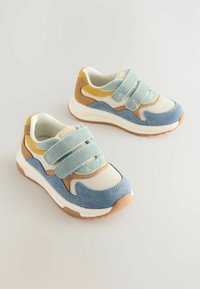 Blue and beige children's sneakers, featuring two Velcro straps, mesh fabric, and suede accents in yellow and tan. Rubber sole for traction.