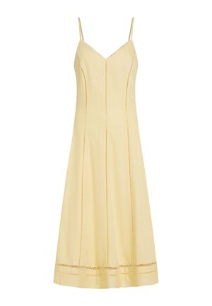 Gele mouwloze jurk met een V-hals, verticale naden en ingewikkelde uitsnijdingen aan de zoom. Gemaakt van lichtgewicht stof.