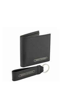 Black leather wallet with a textured finish, featuring a silver logo and matching keychain with a ring, both from Armani Exchange.