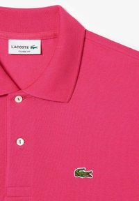 Lacoste Piké - rose fushia sqi