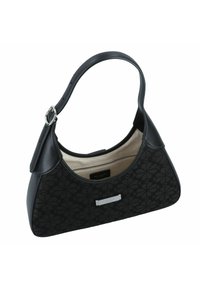 Black handbag with a floral pattern, leather and fabric material, curved handle, and silver hardware. Beige interior with zipper pocket.