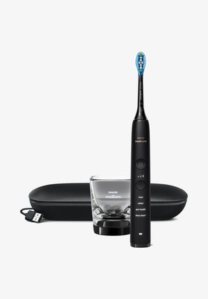 Spazzolino elettrico Sonicare in plastica nera, dotato di un testina blu e verde, pulsanti di controllo e luci indicatori, con supporto in vetro e custodia.
