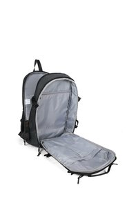 Zaino nero con un interno grigio, dotato di un ampio scomparto principale, tasca con zip e spallacci regolabili. Progettato per la funzionalità.