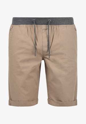 Beige bombažne kratke hlače z sivim elastičnim pasom, zavezovanjem in zavihanimi robovi. Imajo dve stranski žepi in gladko teksturo.