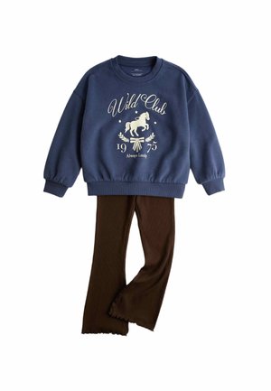 Navy blue sweatshirt with "Wild Club" horse graphic and brown flared pants with scalloped hems laid flat on white background.