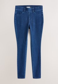 Tamsiai mėlynos džinsinės tamprės siauro silueto, vidutinio aukščio liemeniu, priekyje kišenės ir siaurai siaurėjančiomis kojų apačiomis su tvarkingais siūlėmis ant apvadų.