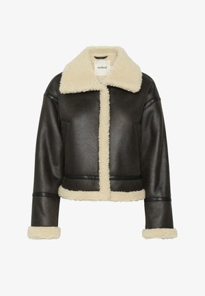 Black faux leather jacket with a cream shearling collar and cuffs. Features a cropped design with a front closure and visible seams.
