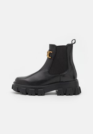 Botines con plataforma - black