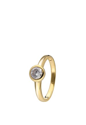 Gold ring with a single round bezel-set clear diamond on a smooth band against a white background.