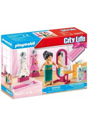Playmobil City Life fashion set features a green figure with black hair, two dresses on mannequins, and a mirror with a display table.