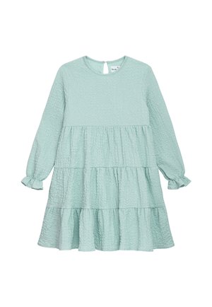 Mintgrünes Kleid mit langen Ärmeln, strukturiertem Stoff, gestuften Rüschendetails und einem Schlüsselrücken. Die Manschetten sind gerafft für einen leicht puffigen Look.