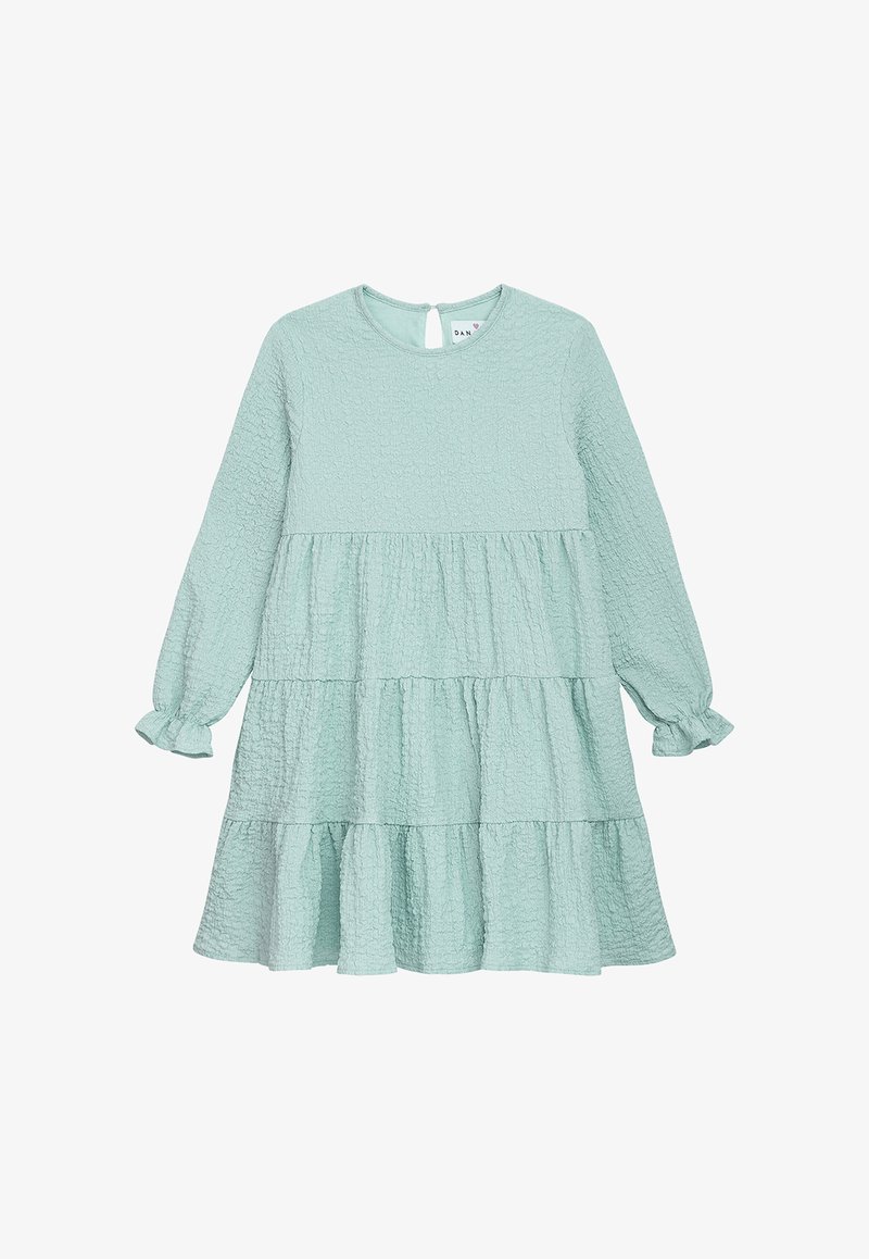 Mintgrünes Kleid mit langen Ärmeln, strukturiertem Stoff, gestuften Rüschendetails und einem Schlüsselrücken. Die Manschetten sind gerafft für einen leicht puffigen Look.