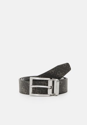 Cintura in pelle nera con motivo stampato e fibbia in metallo argentato. Presenta una texture liscia e un design contemporaneo.