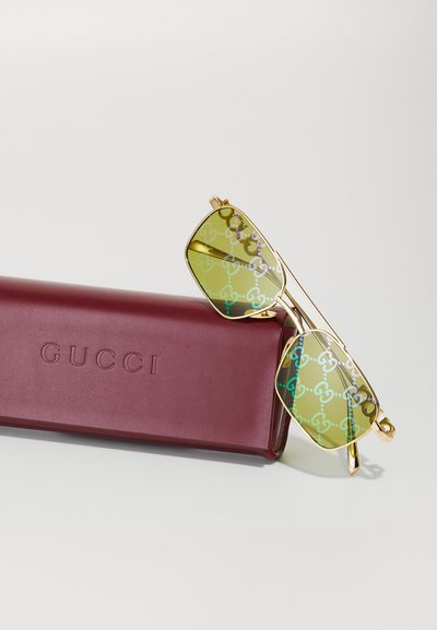 Gucci UNISEX - Slnečné okuliare - gold-coloured