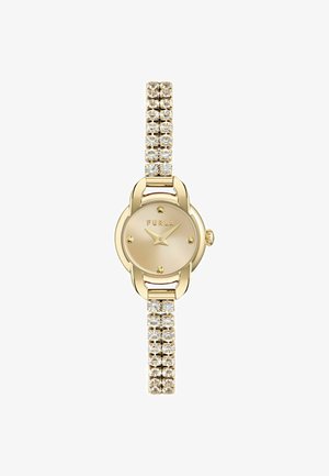 Ceas de mână cu o carcasă aurie, cu un cadran rotund, brățară împodobită cu cristale și un cadran bej deschis cu marcaje și ace aurii.