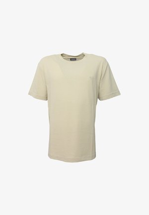 T-shirt in cotone beige con maniche corte, scollo rotondo e un piccolo logo sulla parte sinistra del petto. Texture morbida, design casual.