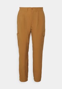 Tan cargo pants featuring a straight cut, pleated front, side pockets, and a button closure for practicality and comfort.