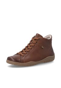 Chaussure montante en cuir marron avec lacets à l'avant, semelle en caoutchouc marron clair et doublure intérieure douce inclinée vers la droite sur fond blanc.