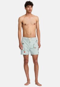 Light blue swim trunks with floral embroidery in red and green, featuring an elastic waistband with a drawstring, above-knee length design.