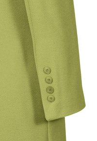 Green textured fabric with a coat sleeve featuring a four-button cuff. The buttons are matchingly colored and round.