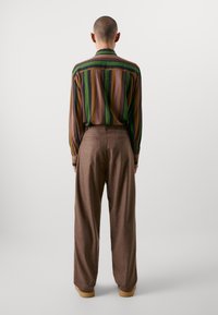 Pal Sporting Goods SAR WORLDWIDE UNISEX - Broek - mocha