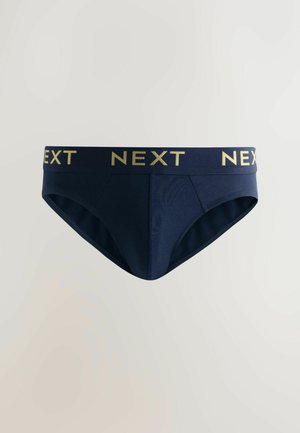 Marineblaue Slips mit einem strukturierten Design, versehen mit einem goldenen "NEXT"-Logo am Bund. Der Stoff ist glatt und weist minimale Nähte auf.