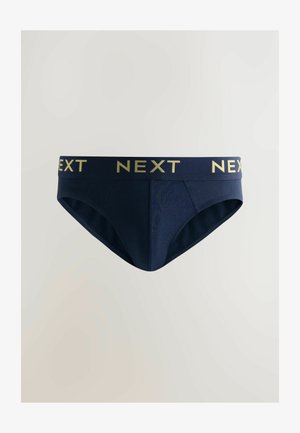 Tamsiai mėlyni apatiniai su struktūruotu dizainu, ant juosmens juostos auksinė "NEXT" logotipo detalė. Audinys lygus, su minimaliais siuvimo elementais.