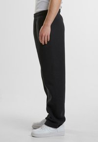 Urban Classics Tracksuit bottoms - black