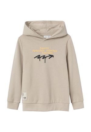 Sweatshirt à capuche beige en tissu doux avec du texte imprimé en jaune et noir. Comprend des bords-côtes aux poignets et à l'ourlet, avec une étiquette sur le côté.