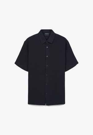 Short-sleeve button-up shirt in dark navy, featuring a collar, front buttons, and a textured fabric with a relaxed fit.