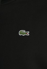 Lacoste Tröja med dragkedja - black
