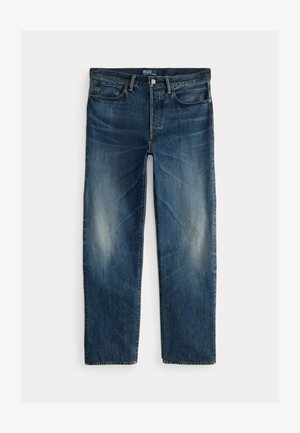 Mørkeblå denimjeans med rett ben-design. Har fem lommer, glidelås og subtile slitasjer foran.