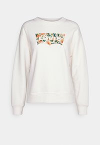 Sweat-shirt blanc col rond à manches longues avec un logo Levi's à motif floral sur la poitrine.
