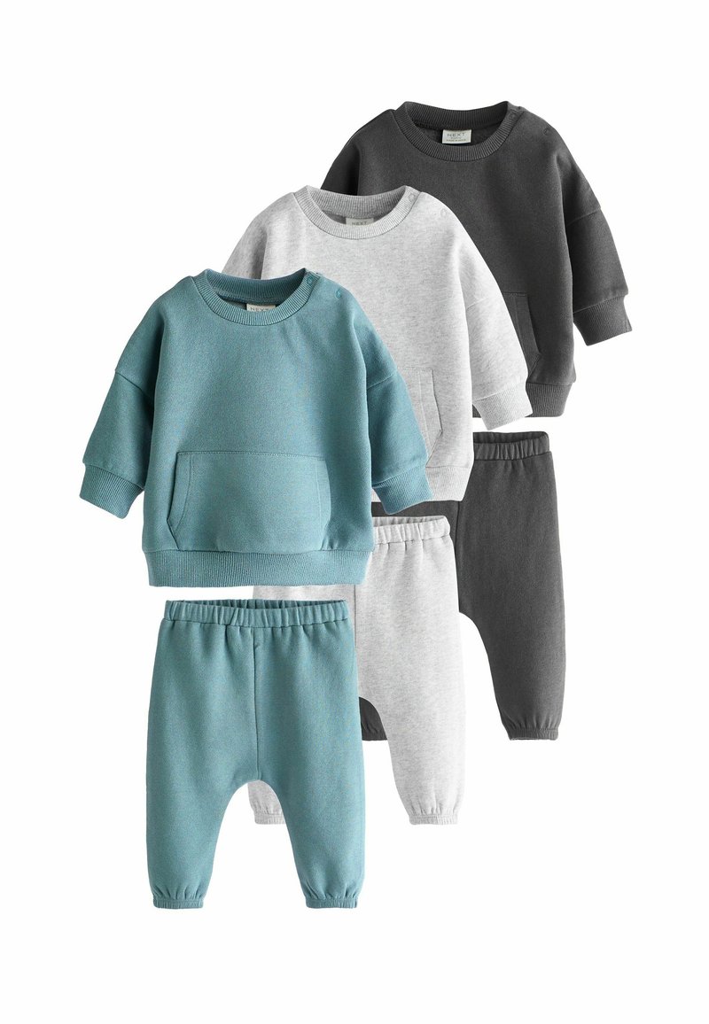 Sweatshirt- en broekset in teal, grijs en zwart. Kenmerken zijn een zachte stof, ronde hals, details met zakken en een elastische tailleband voor comfort.