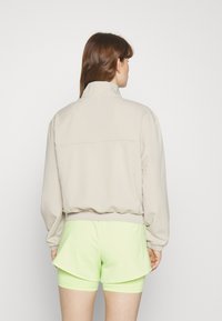 adidas Performance AEROREADY TRAIN ESSENTIALS QUARTER ZIP - Treningsjakke - beige/white