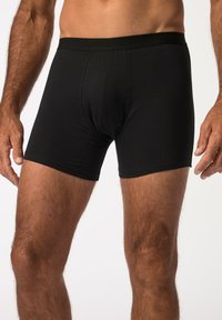 Boxer briefs neri realizzati in morbido tessuto, con un design semplice, cintura elastica e una vestibilità attillata per comfort e supporto.