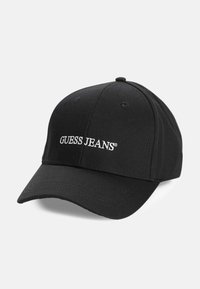 Căciulă de baseball neagră din material textil, cu logo-ul brodat "GUESS JEANS" în alb. Pliuri curbate și curea ajustabilă la spate.