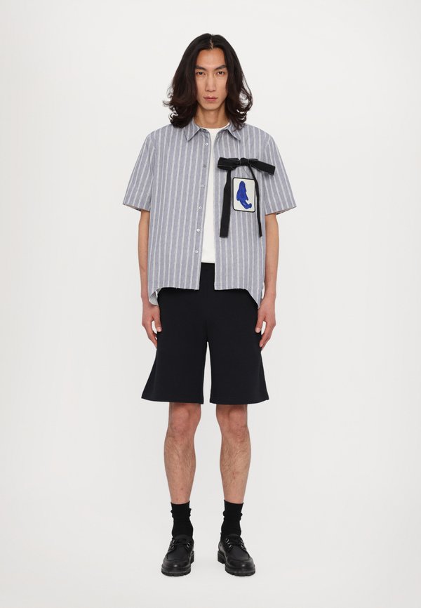 BAGGY ELASTICATED UNISEX - Tracksuit bottoms